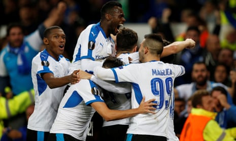 The Apollon Limassol players are jubilant after Hector Yuste headed in the equaliser.