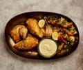 Yotam Ottolenghi’s roast poached chicken with whipped garlic.