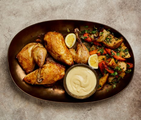 Yotam Ottolenghi’s thrifty roast poached chicken with whipped garlic.