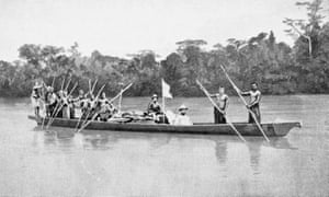 Mary Kingsley photographed in her expedition canoe on the Ogooué River in 1895.