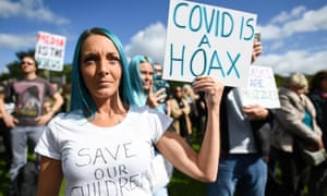 Protestors in Edinburgh demonstrate against a secondary lockdown in Scotland.