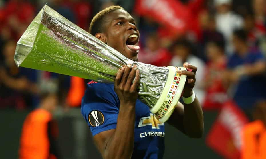 Paul Pogba celebrates with the Uefa Cup