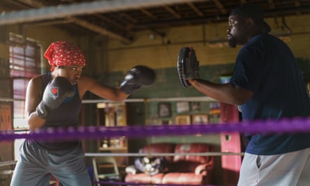 film still of man and woman boxing