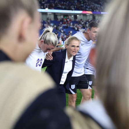 Sarina Wiegman, Manager of England speaks to her team after their victory.