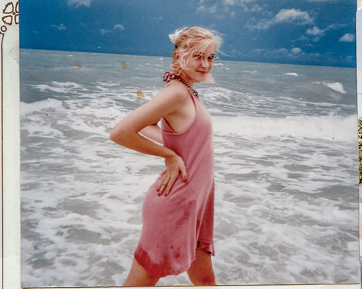 Giuffre as a teenager on the beach in a pink dress