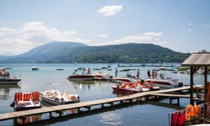 People board a boat in Annecy, France, in May
