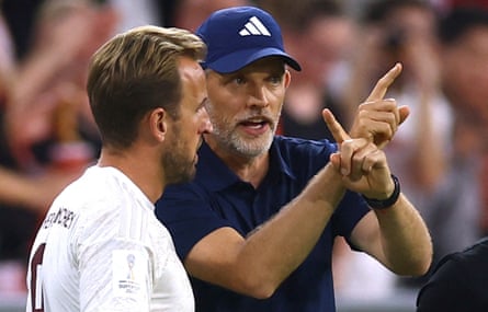 Harry Kane receives instructions from manage Thomas Tuchel before coming on as substitute for his first appearance for Bayern Munich