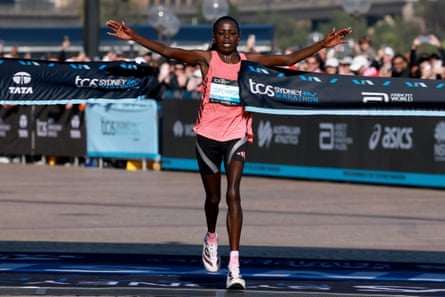 Kenya’s Peres Jepchirchir celebrates as she wins the women’s race at the 2026 Sydney Marathon