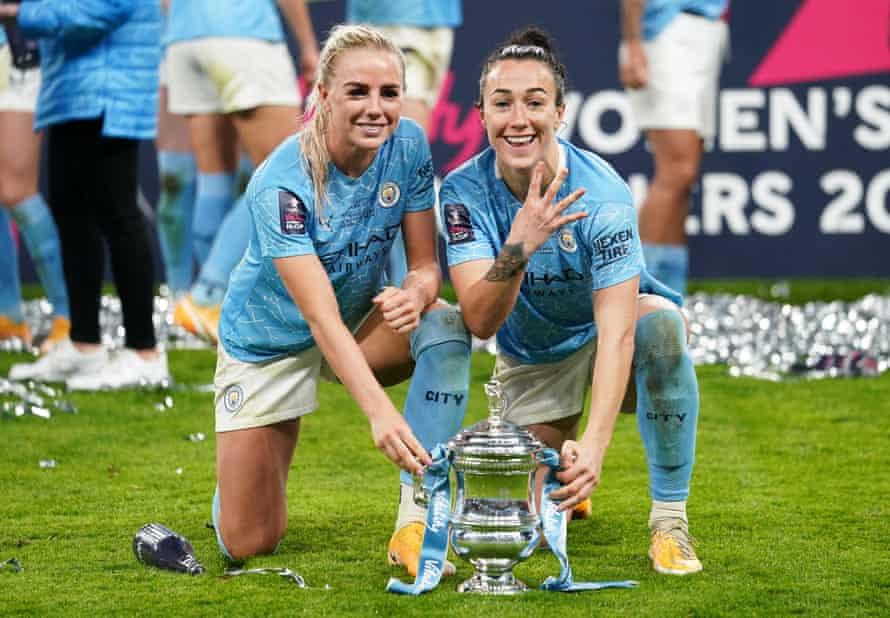 Alex Greenwood and Lucy Bronze celebrate finally winning the FA Cup with Manchester City in November