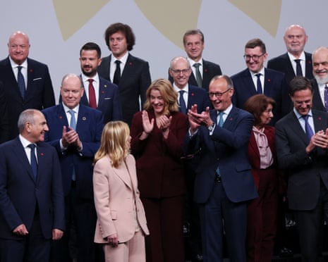 Italian prime minister Giorgia Meloni, German chancellor Friedrich Merz, Nato Secretary General Mark Rutte, Spanish prime minister Pedro Sanchez and Albania's prime minister Edi Rama react as they and other leaders pose for a family photo at the European Political Community summit, in Copenhagen, Denmark.