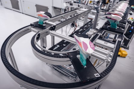 a conveyor belt at the On sports shoe factory in Zurich.