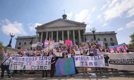 The Trans Student Alliance at the University of South Carolina holds a rally to protest a controversial bill that would ban transgender people from choosing the bathroom they use.