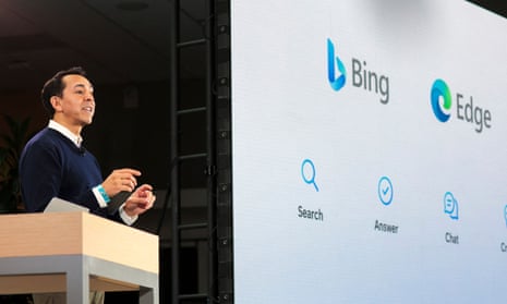 man next to screen showing bing and edge logos