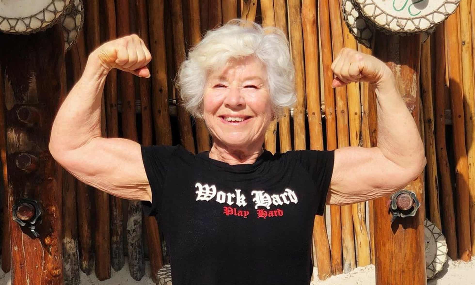 MacDonald flexes her arms to show her progress