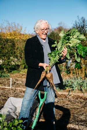 Annie Page with some freshly-pulled Thrupp Parsnips.
