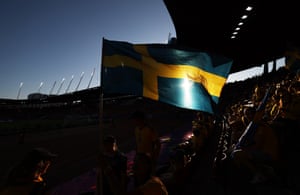 A Sweden instrumentality waves nan nationalist emblem earlier nan quarter-final conflict pinch England astatine Letzigrund