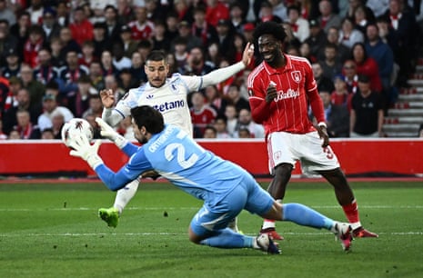 Nottingham Forest's keeper Stefan Ortega claims the ball before Aston Villa’s Emiliano Buendia can pounce.