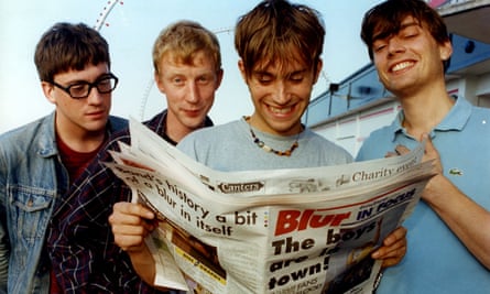 Tickled pink … Blur check out the Grimsby Telegraph’s Blur supplement in 1995, from left: Graham Coxon, Dave Rowntree, Damon Albarn and Alex James.