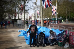 Royal fans John Loughrey and Sky London wait on the Mall outside Buckingham Palace, where they have set up camp, ahead of the Coronation of King Charles and Camilla, which will take place next weekend