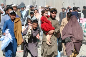 People cross into Pakistan at the border with Afghanistan.