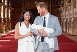 Windsor, UK. Prince Harry, Duke of Sussex and his wife Meghan, Duchess of Sussex present their newborn son in St George’s Hall at Windsor Castle
