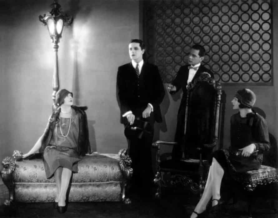 June (left) and Ivor Novello (centre) in The Lodger, 1927.