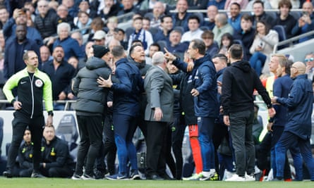 Brighton and Tottenham coaching staff argue on the touchline