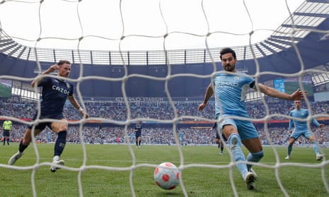 Ilkay Gündogan scores Manchester City’s third goal on the last day of 2021-22, to beat Aston Villa and win the Premier League title.