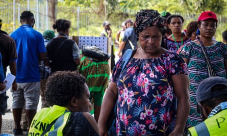 A woman waits to vote at the Gordons International School polling location. East electorate in Port Moresby