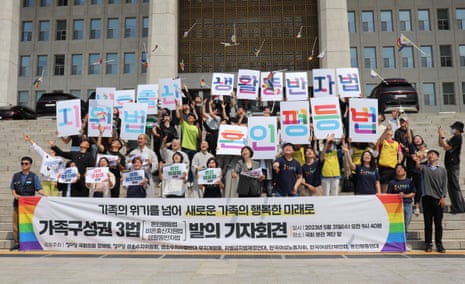 Marriage equality supporters gather outside the National Assembly in Seoul, South Korea, on Wednesday to mark the launch of the country's first same-sex marriage bill.