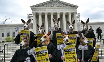 Activists dressed like a ‘kangaroo court’ demonstrate outside the US supreme court as it heard argument in Donald Trump’s immunity case.