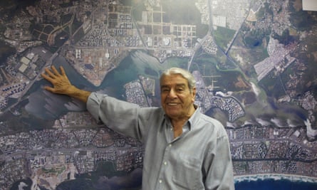 Carlos Carvalho with a map of the area around the Olympic Park in Rio.