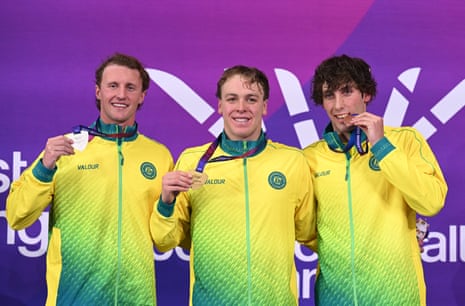 Elijah Winnington (left), Sam Short (centre), and Benjamin Godemans proudly show off their respective silver, gold and bronze medals for the men’s 400m freestyle.