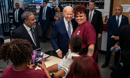 Joe Biden with a staff member during a visit to Mario’s Westside Market grocery store, alongside Representative Steven Horsford, in Las Vegas, Nevada, on 16 July 2024.
