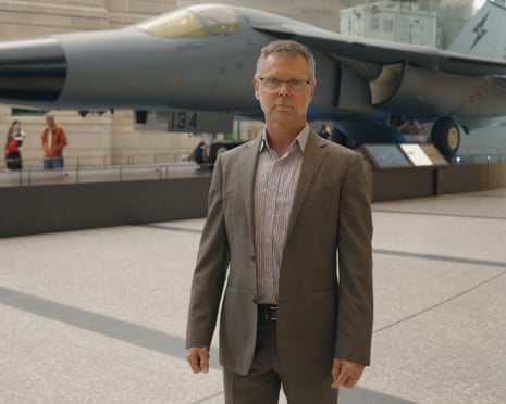 Lyle Holt in front of an RF-111C strike reconnaissance aircraft