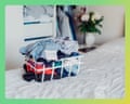 Clear intentions: a designated basket can stop unwanted clothes from becoming another pile to deal with.