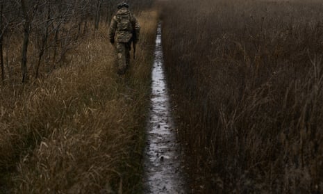 Soldiers of the 58th separate mechanized brigade go to their positions along the trenches in Vuhledar, Ukraine.