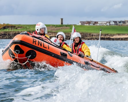 Volunteers on a lifeboat