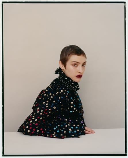 Abova wears top, £3,860, and cape, £2,305, by Saint Laurent.