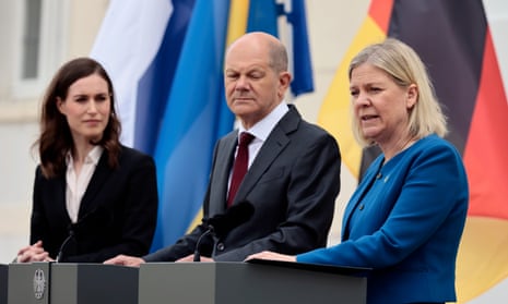 The Finnish prime minister, Sanna Marin (left) with German chancellor Olaf Scholz (centre) and the Swedish prime minister, Magdalena Andersson (right).