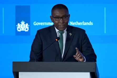 A man in front of a microphone.