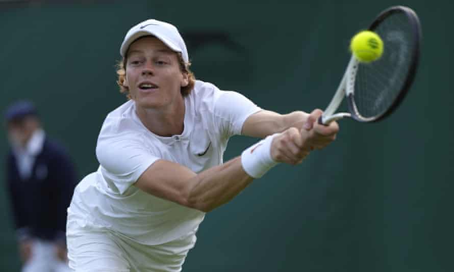 Jannik Sinner stretches for a return during his victory over Stan Wawrinka.