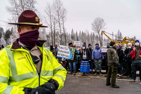 Environmental activists protest in front of the construction site for the Line 3 oil pipeline.