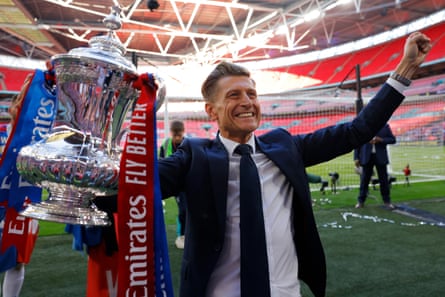 The Crystal Palace co-owner Steve Parish celebrates with the trophy after the FA Cup final at Wembley