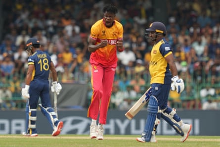 Zimbabwe’s Blessing Muzarabani celebrates taking the wicket of Sri Lanka’s Kusal Perera (right) during the T20 World Cup match in Colombo