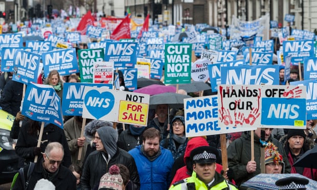 Thousands march through London to protest against underfunding and privatisation of the NHS