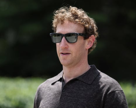 mark zuckerberg in black sunglasses and a grey polo shirt