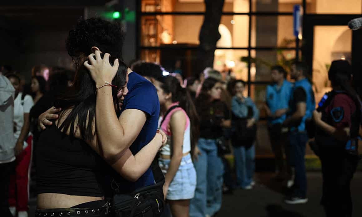 People gather near the hotel where Liam Payne died