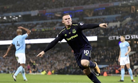 Wayne Rooney celebrates putting Everton ahead at Manchester City, to the consternation of Vincent Kompany and John Stones.