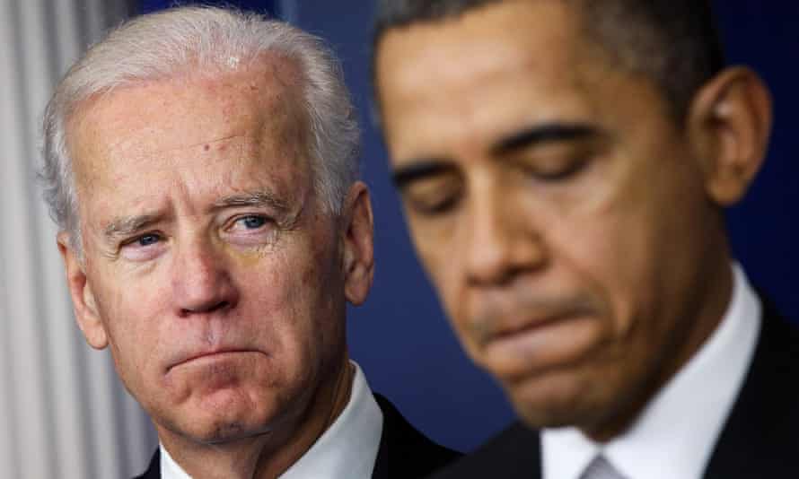 Joe Biden listens to Barack Obama at the White House in December 2012.